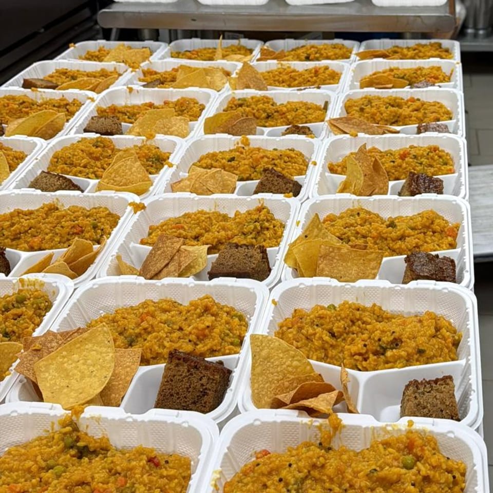 Rows of prepared meals ready to be shared
