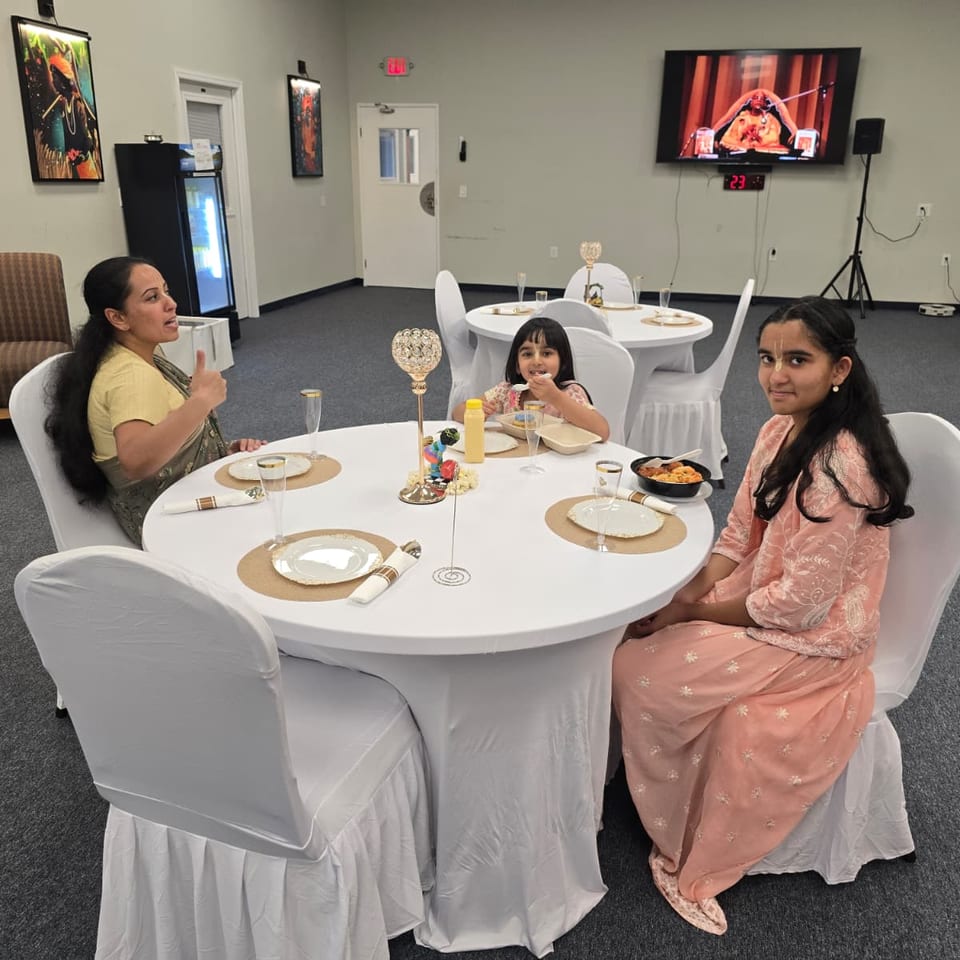Guests sharing a meal in the cafe dining area